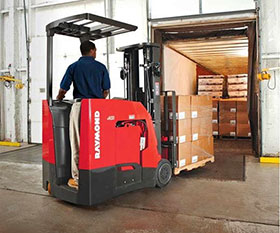 Photo of person loading a shipping truck