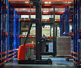 Photo of an automated warehouse order picker