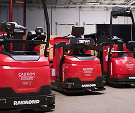 Photo of a group of automated lift trucks